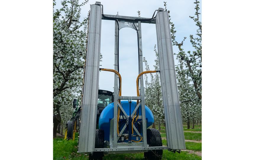 2000L 2D Apple Sprayer in an apple orchard